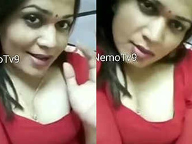 Busty Boudi flaunts her assets in a revealing outfit