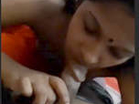 Desi girl gives a cute blowjob in a steamy video