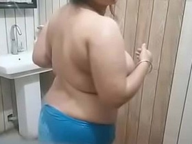 Desi bhabhi's huge boobs in the bathroom