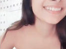 A TikTok girl flaunts her big boobs in a seductive video