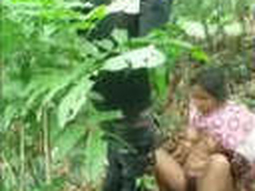 Indian couple enjoys intimate moment in the forest