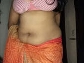 Indian wife showcases her stunning figure in the comfort of her home