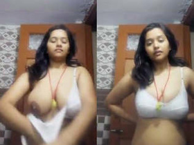 Merged video of a Desi girl flaunting her breasts and vagina