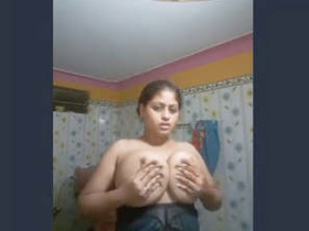 Indian wife flaunts her large breasts