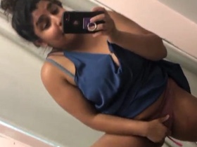Horny girl pleasures herself with her fingers