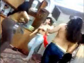 Two Indian girls dance and show off their bodies in their bras