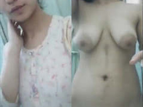 A busty girl flaunts her assets in a steamy video