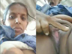 Tamil aunty flaunts her breasts and intimate area