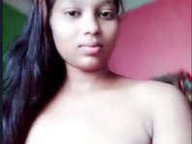 Indian bhabhi flaunts her assets in steamy video