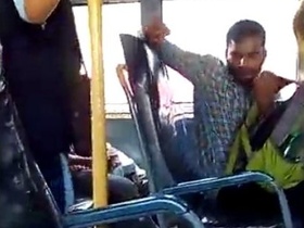 A man masturbates on a bus, aware that a female passenger is recording