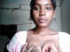 Desi Indian woman flaunts her breasts on VC