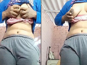 Indian girl flaunts her boobs and pussy in a steamy video