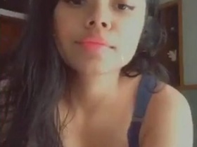 Indian girl flaunts her curves in a seductive performance