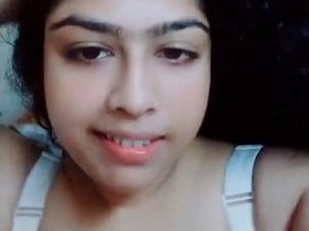 Indian girl flaunts her breasts and vagina in a seductive manner
