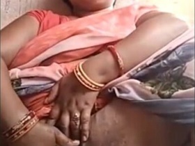 Rural Indian woman masturbates with fingers