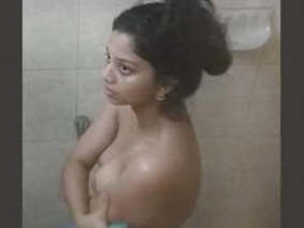 Stunning Indian girl gets naughty in a new bathing clip