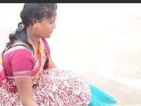 Mature auntie gets wet and wild on the beach