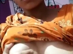Indian babe flaunts her breasts and vagina