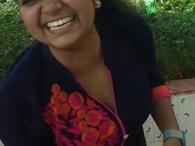 Priya, a sexy Indian girl, gives a blowjob to her boyfriend on the stairs