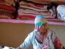 Village boy has sex with mature woman in rural setting
