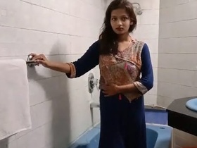 Cute desi girl wears a pretty dress in paid porn video