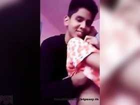 Teenage couple indulges in foreplay and steamy home sex