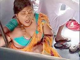 Big-busted Indian bhabi flaunts her curves on a train
