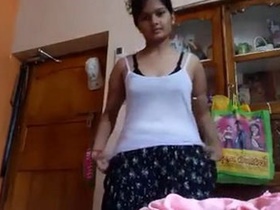 Horny Indian girl pleasures herself with her fingers