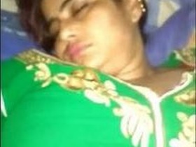 Husband pleasures his sleeping wife with his fingers