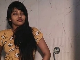 Nude Indian girl takes a nude selfie in the bathroom