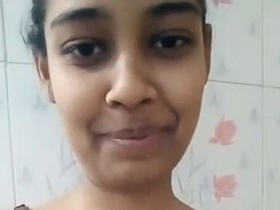 Nude Indian girl takes solo nude selfies without a bra