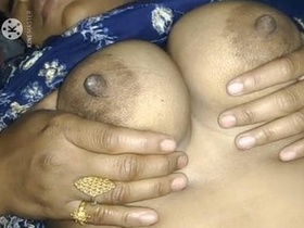 Desi wife's breasts fondled by her husband