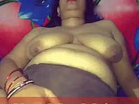 Horny Indian aunty indulges in self-pleasure and sucks a hard cock