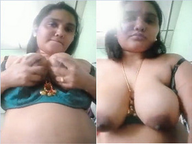 Indian bhabhi flaunts her huge tits in exclusive porn video