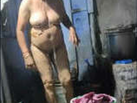 Indian bhabhi takes a bath in front of the camera