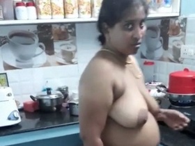 Watch a hot Tamil aunty cook naked in Chennai
