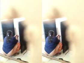 Amateur Indian bhabhi records herself peeing in hidden video