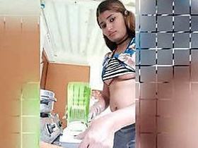 Naidu Swathi flaunts her nip in the kitchen
