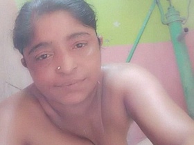 Indian housewife gets naked in the bathroom