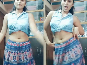 Watch this sexy Indian girl dance seductively in a short skirt