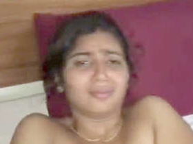 Sunbathing couple indulges in boob and pussy play by the beach