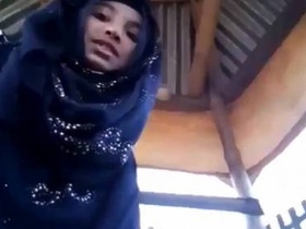 A young and cute hijabi girl from India shows off her pretty pussy