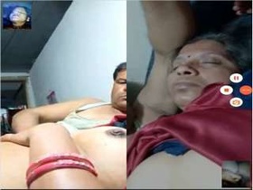 Indian wife shows off her husband's breasts to a friend on video call