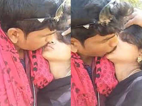 Indian couple shares passionate outdoor kisses