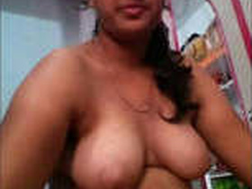 Desi babe pleasures herself with fingers in this steamy video