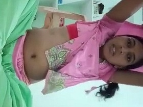 Desi girl fingers herself while undressing