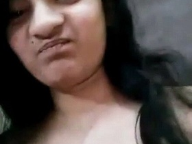 Cute brunette flaunts her body in steamy video