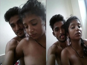 Desi couple's steamy selfie video with topless girl kissing her boyfriend