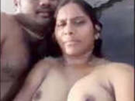 Indian couple enjoys a romantic getaway at the beach