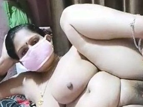 Big boobed Husboo flaunts her body and fingering skills in a solo video